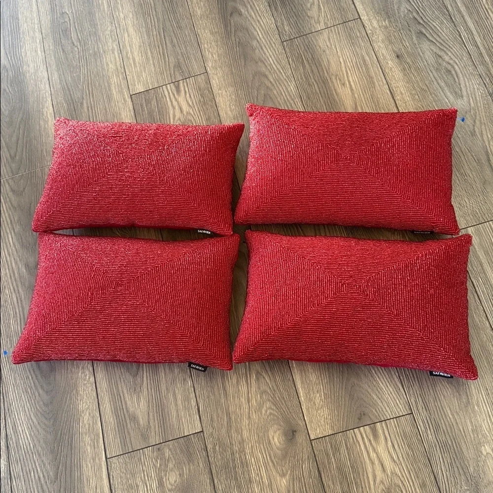 4 SAFAVIEH Beautiful Beaded toss pillows in a rich jewel tone red